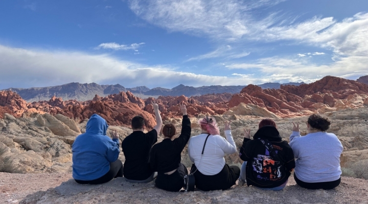 students at Valley of Fire State Park--Students sitting down with peace signs